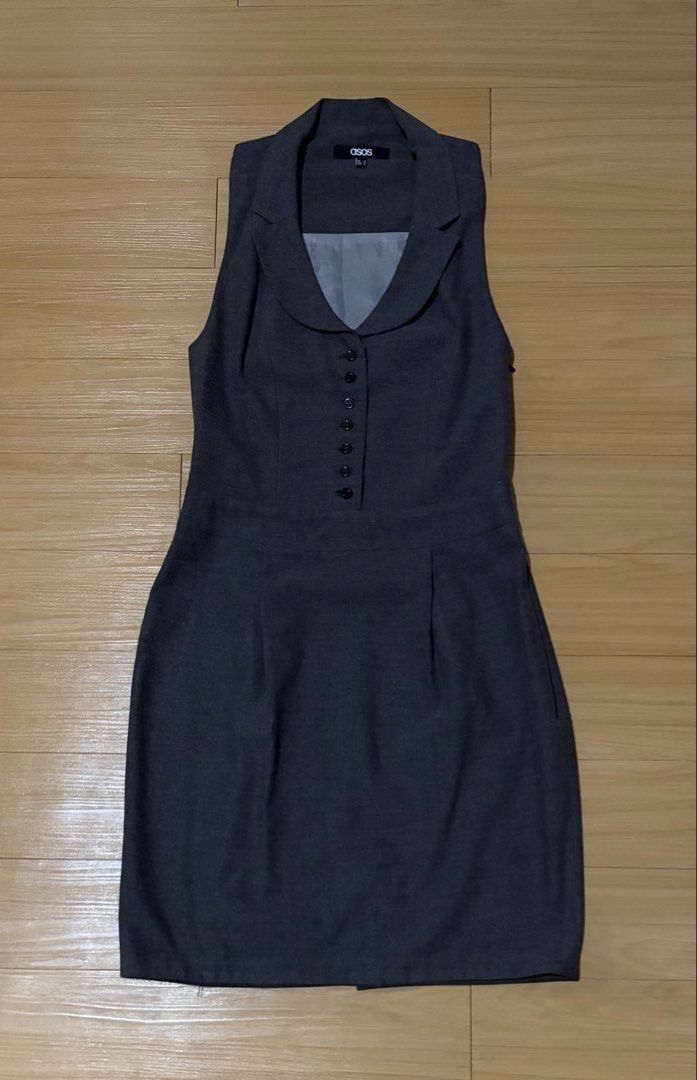 ASOS Casual / Office Dress Small (Category: Dresses) located in Quezon City. Submitted by garagesale2026 (Listing ID 1468706240, Image 1). Description: - Used once - In very good condition - Color: Dark Grey - Sleeveless with collared neckline; Button-down front; Knee-length; Tailored fit; Vest dress style - Made in Romania - Waist: 26"; Width: 15"; Length(from waist): 18.5".