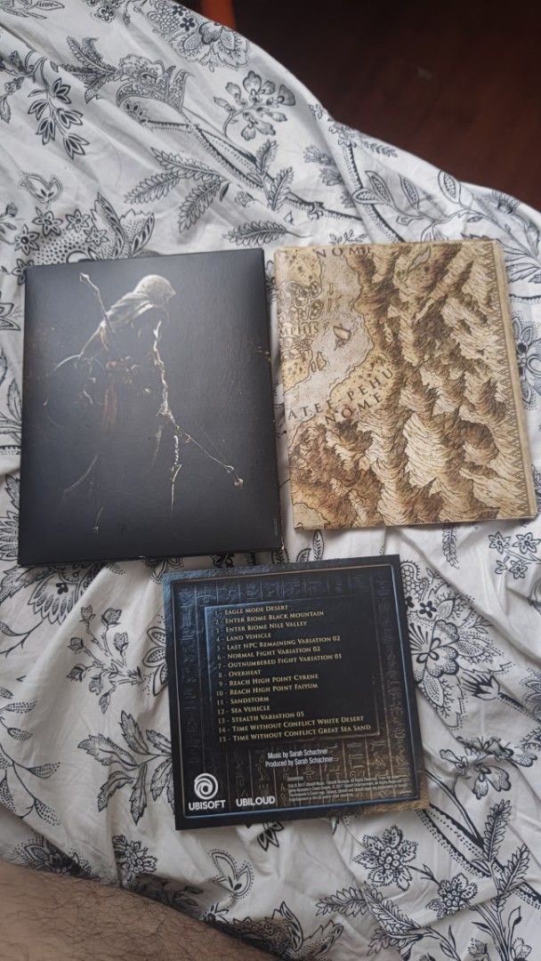 Assassin's Creed Odyssey OST & Map (Category: CDs & DVDs) located in Quezon City. Submitted by cheems_ (Listing ID 1468557788, Image 3). Description: for sale assassin's creed oddysey ost & map never been used rfs: decluttering loc: pasig mop: gcash shipping c/o buyer pm if interested.
