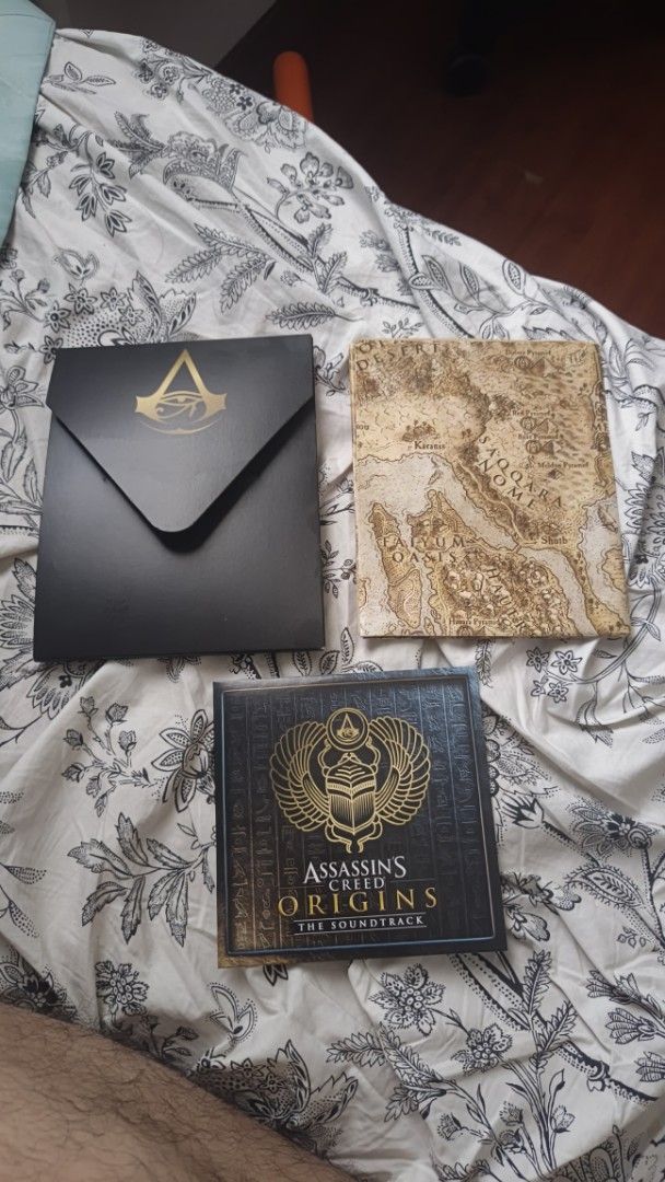 Assassin's Creed Odyssey OST & Map (Category: CDs & DVDs) located in Quezon City. Submitted by cheems_ (Listing ID 1468557788, Image 2). Description: for sale assassin's creed oddysey ost & map never been used rfs: decluttering loc: pasig mop: gcash shipping c/o buyer pm if interested.