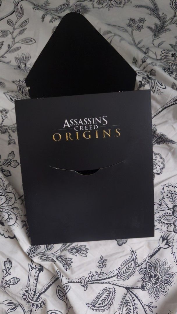 Assassin's Creed Odyssey OST & Map (Category: CDs & DVDs) located in Quezon City. Submitted by cheems_ (Listing ID 1468557788, Image 1). Description: for sale assassin's creed oddysey ost & map never been used rfs: decluttering loc: pasig mop: gcash shipping c/o buyer pm if interested.