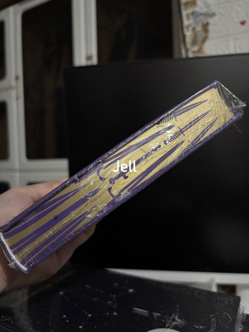 Assistant to the Villain Special Edition (Category: Storybooks) located in Calamba. Submitted by jeLLaaax (Listing ID 1468603747, Image 2). Description: - Title: Assistant to the Villain by Hannah Nicole Maehrer - Edition: Hardcover Special Edition - Features: Stunning purple sprayed edges with sword design - Condition: Brand new, unopened, still in original plastic shrink wrap - Note: Includes Target sticker on the front cover - Perfect for coll