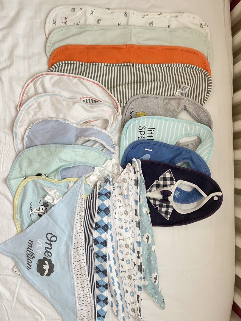 Assorted Baby Bibs and Burp Cloths Set (Category: Babies & Kids Fashion) located in Baliuag. Submitted by jhennsoasis (Listing ID 1468529984, Image 1). Description: - Large bundle of baby bibs and burp cloths - Includes bandana triangles, traditional round bibs, and rectangular burp cloths - Features a mix of solid colors, stripes, checks, and cute prints (sheep and little man bowtie) - Made of soft and breathable cotton fabric - Perfect for dail