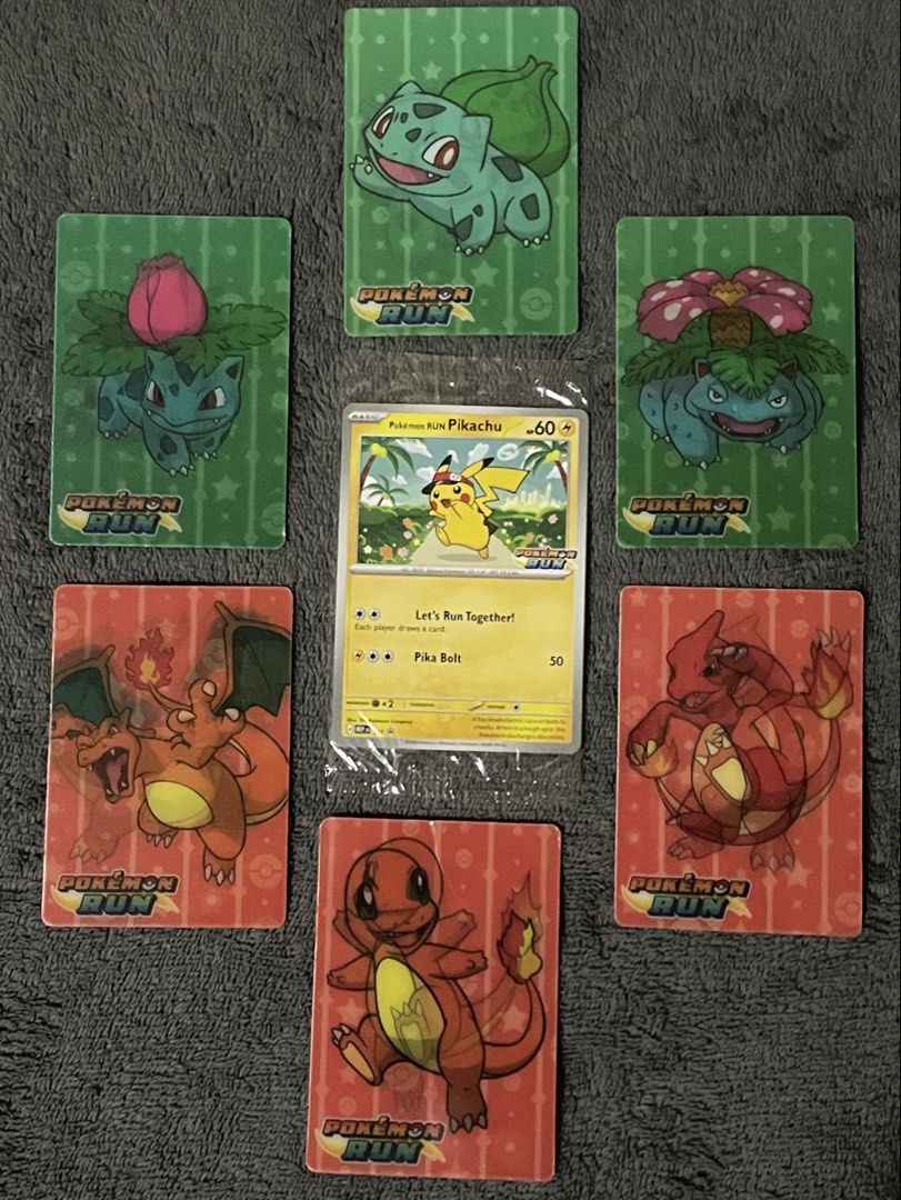 Assorted characters (Category: Raw Singles) located in Taytay. Submitted by pandecocow (Listing ID 1468649282, Image 1). Description: Package Inclusion: - Promo Card - Bulbasaur Evolution (Lenticular card) - Charmander Evolution (Lenticular card) - Pokemon Run T-shirt (Small) Price is nego.