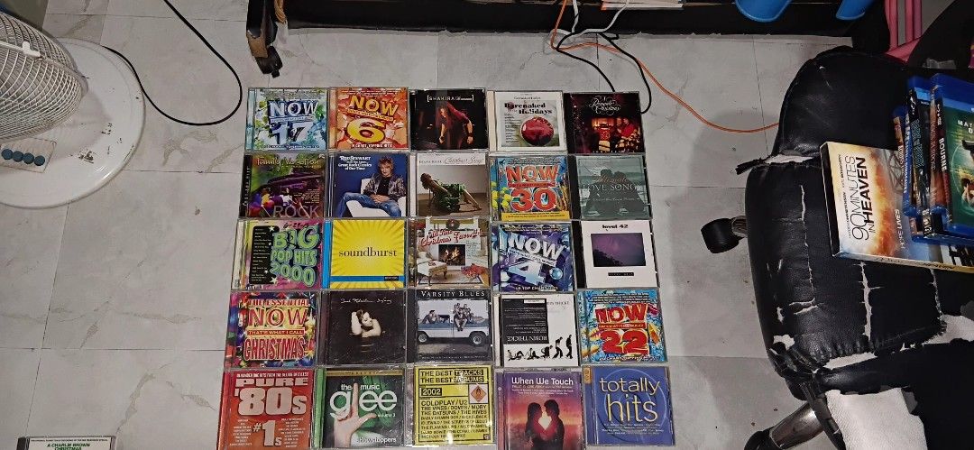 Assorted Music CD Albums and Compilation CDs Lot (Category: CDs & DVDs) located in Manila. Submitted by euphy.aleyla (Listing ID 1468666352, Image 3). Description: - 200 per cd. -Massive music CD collection sold as a complete batch - Features popular compilation series like Now That's What I Call Music, pop hits, 80s throwbacks, and holiday albums - Includes a variety of artists and genres - Cases show normal shelf wear - Ideal for starting or ex
