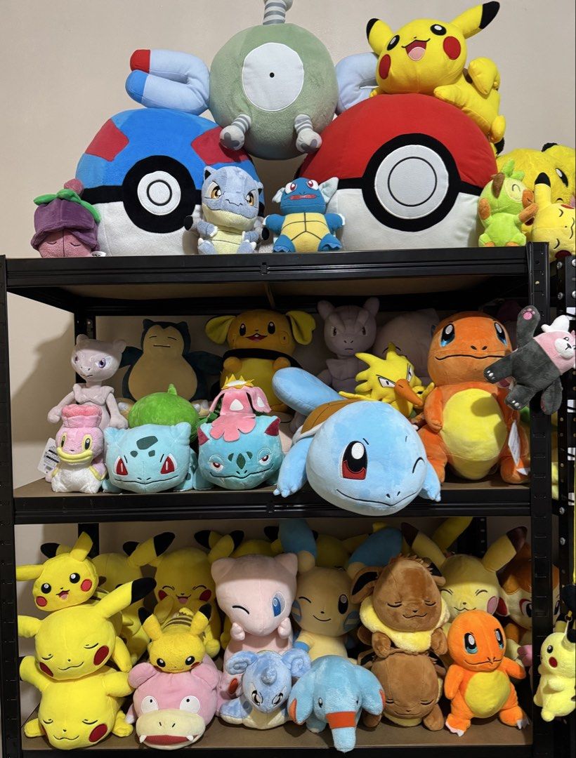 Assorted Pokemon plush toy collection various characters (Category: Plushies & Soft Toys) located in Cainta. Submitted by mayhroeen (Listing ID 1468688742, Image 2). Description: Massive collection of Pokemon plushies stacked on shelves. Includes Pikachu, Squirtle, Mew, Charmander, Snorlax, Eevee, and many more. Various sizes and designs, plus Pokéball plush cushions and crossbody bags. Great for collectors or fans wanting to grab multiple plush 