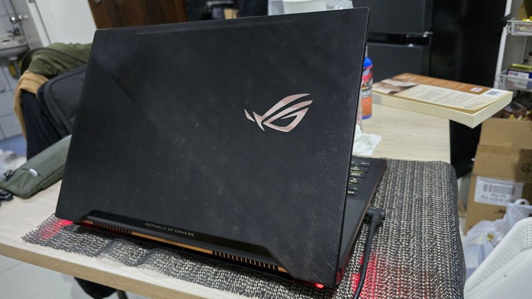 ASUS ROG Zephyrus GX501VS Gaming Laptop (Category: Laptops & Notebooks) located in Angeles City. Submitted by ar.rsd (Listing ID 1468669650, Image 1). Description: - Model: ASUS ROG Zephyrus GX501VS Gaming Laptop - Color: Black - Included: Original power cable and charging brick - Cooling: Features built-in folding stands on the bottom panel for better airflow - Condition: Heavy daily usage marks on the chassis, but works perfectly - LOW BATTERY 