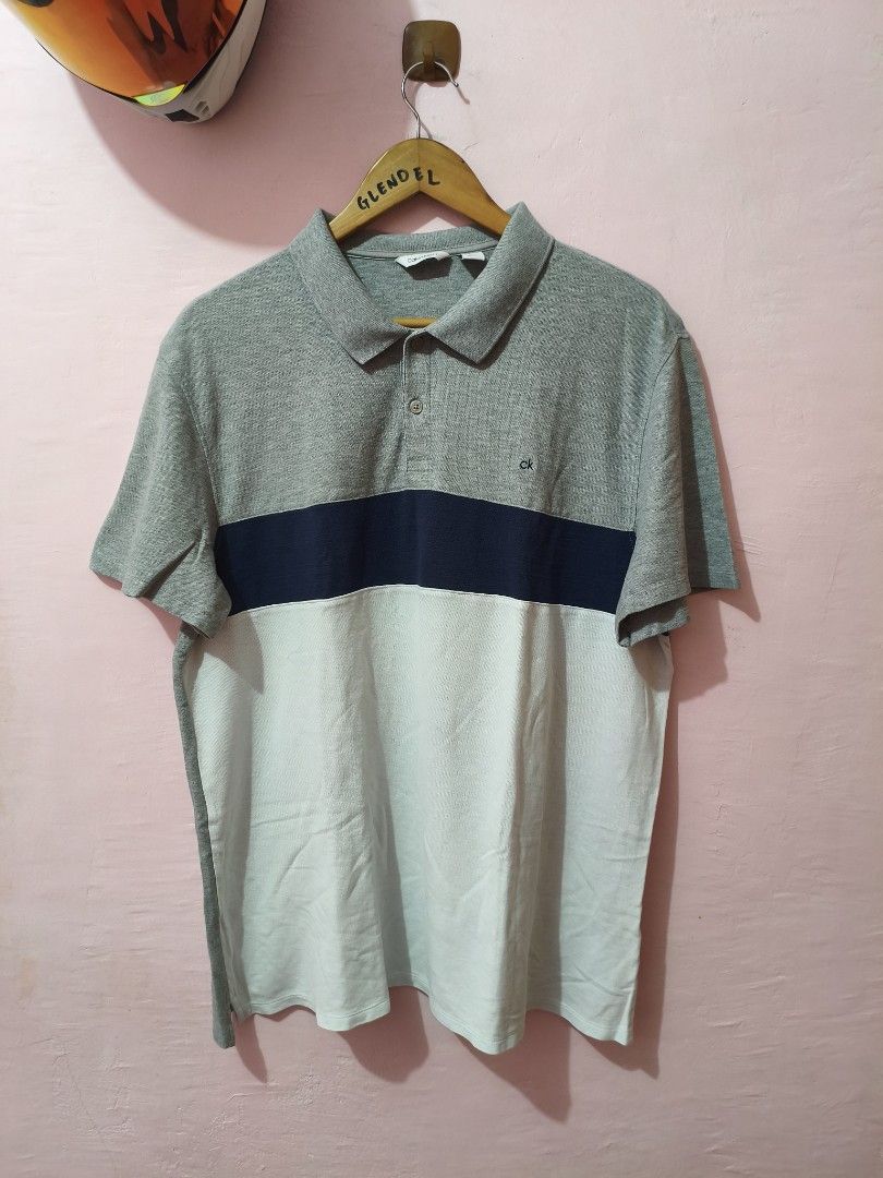 Auth. Calvin Klein Multi Color Polo shirt (Category: Tshirts & Polo Shirts ) located in Paranaque City. Submitted by glendel_04 (Listing ID 1468682421, Image 1). Description: Excellent cond Size Large (22 x 28) Need wash. .