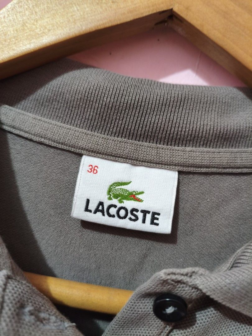 Auth. Lacoste Grey Polo Shirt (Category: Shirts) located in Paranaque City. Submitted by glendel_04 (Listing ID 1468682241, Image 2). Description: Good cond 9.8/10 Size 36 Need wash..