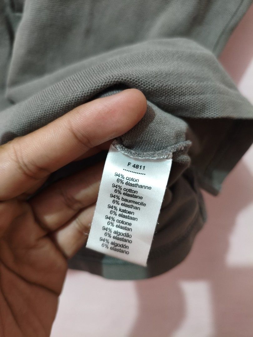 Auth. Lacoste Grey Polo Shirt (Category: Shirts) located in Paranaque City. Submitted by glendel_04 (Listing ID 1468682241, Image 3). Description: Good cond 9.8/10 Size 36 Need wash..