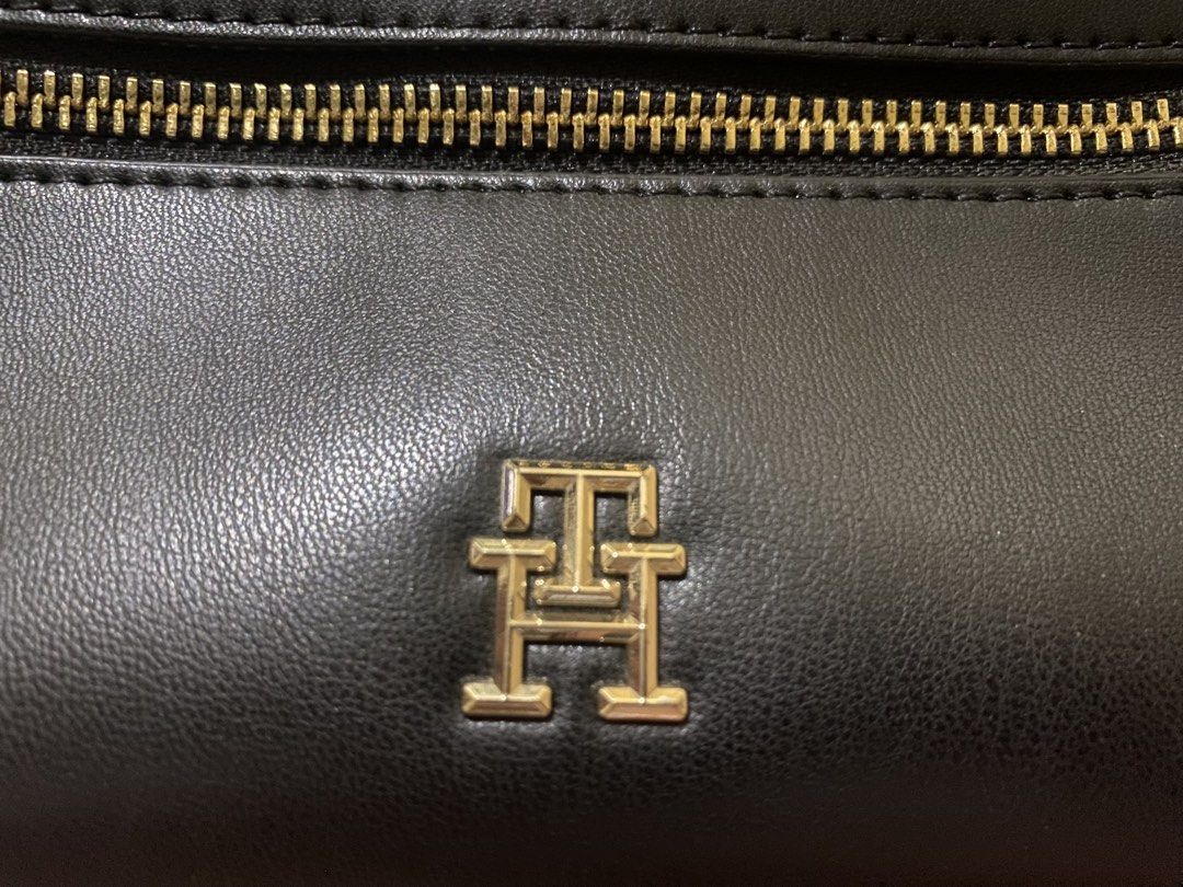 Authentic Black Tommy Hilfiger Sling Bag in Golf Hardware (Category: Shoulder Bags) located in Quezon City. Submitted by luckyg4l (Listing ID 1468687168, Image 2). Description: negotiable authentic .