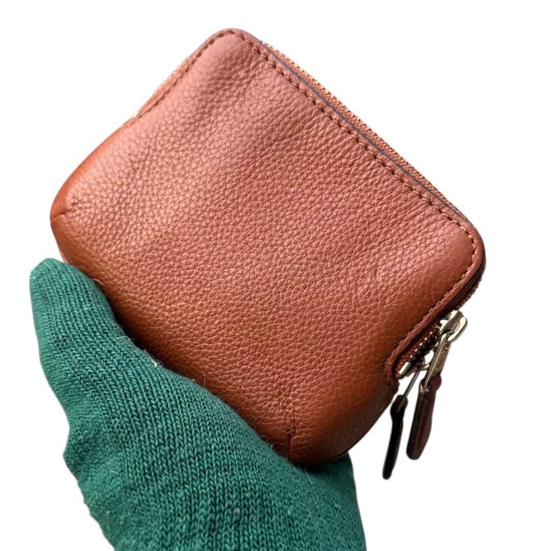 Authentic COACH Coin purse (Category: Clutches) located in San Fabian. Submitted by rei_aniels (Listing ID 1468708966, Image 3). Description: Authentic COACH Coin purse Like new Pebbled leather Brown With cards Slot .
