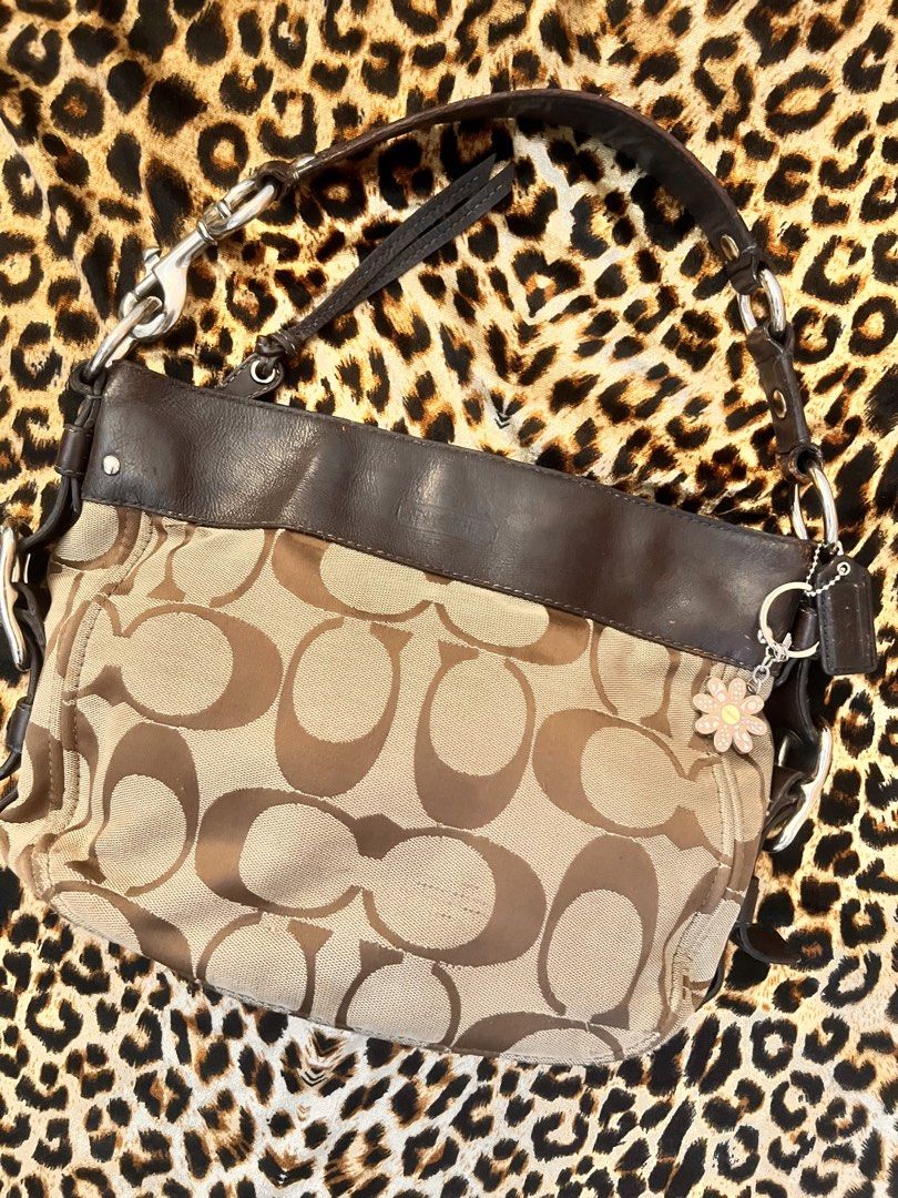 Authentic Coach Zoe Monogram Kili shoulder hobo bag (Category: Shoulder Bags) located in General Mariano Alvarez. Submitted by dreamgirlcloset (Listing ID 1468529088, Image 1). Description: Has minimal scrubs on canvas just see deets but not visible in person! Very y2k bag! Dm me for more deets! Ig shop: @retropeeps.garage.