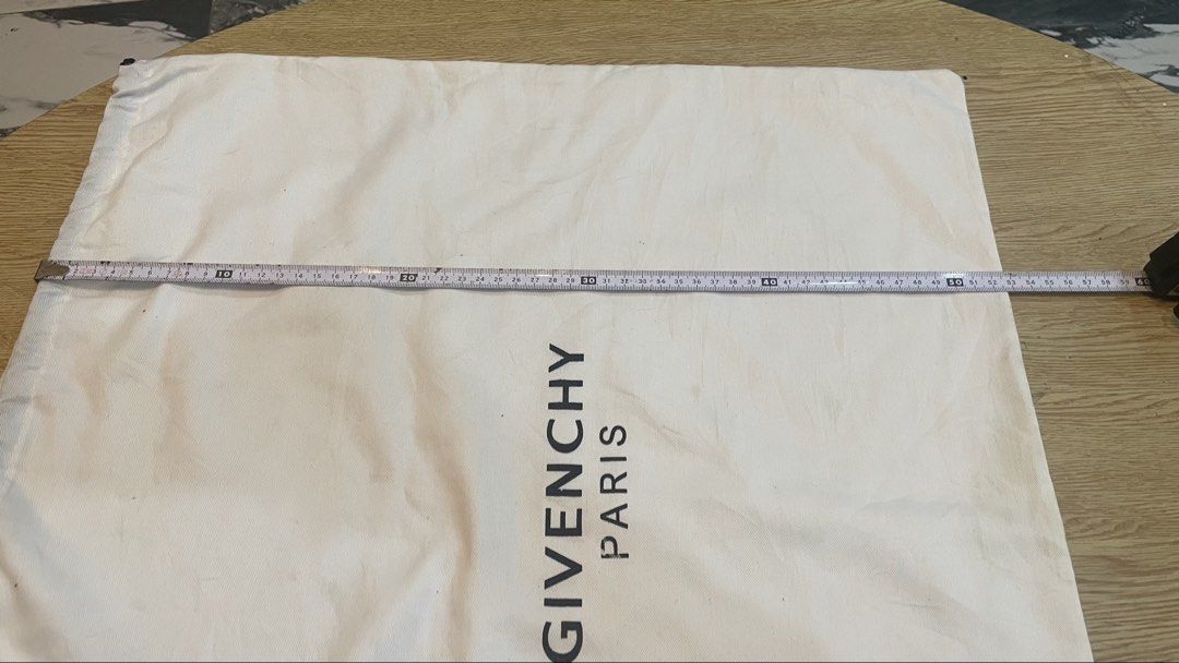 Authentic givenchy big dust bag (Category: Luxury Apparel) located in Cavite. Submitted by ohmie23 (Listing ID 1468687445, Image 2). Description: Authentic givenchy big dust bag.