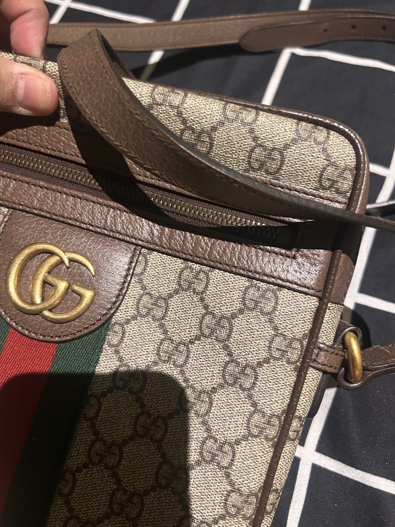 AUTHENTIC Gucci GG Supreme Ophidia Messenger Bag (Category: Luxury Bags & Wallets) located in Calasiao. Submitted by chi199 (Listing ID 1468709632, Image 2). Description: - Brand: Gucci - Model: GG Supreme Canvas Messenger Bag (Model: 547926 520981) - Material: GG Supreme canvas with brown leather trim - Design: Classic green and red web stripe with gold-tone interlocking G hardware - Features: Adjustable brown leather shoulder strap, exterior zi