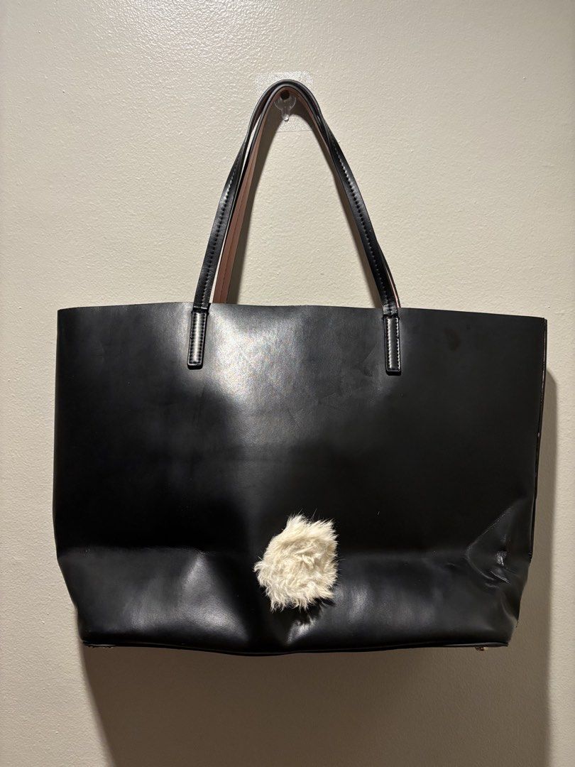 Authentic Kate Spade Large Tote (Category: Luxury Bags & Wallets) located in Manila. Submitted by eliteinme (Listing ID 1468666886, Image 2). Description: With minor flaws as shown but still very nice. Collection: Kate Spade Make Magic Collection Model Name: Make Magic Rabbit Hallie Leather Tote Material: Smooth black crosshatched/refined leather with suede-lined interior ears and gold-tone metallic whisker hardware. Colorway: Black with soft pin