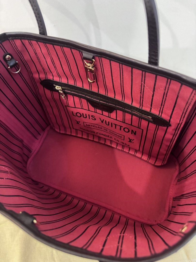 Authentic Louis Vuitton Damier Ebene Neverfull PM (Category: Luxury Bags & Wallets) located in Manila. Submitted by closet.detash (Listing ID 1468652993, Image 3). Description: - Guaranteed Authentic Neverfull PM - 2015 date code - Clean Inside, No cracks on the straps - Please see last photo for the small flaw since that part is folded. - Bag and Dustbag only.