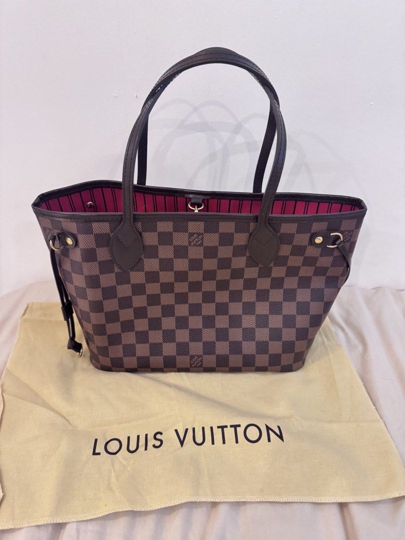 Authentic Louis Vuitton Damier Ebene Neverfull PM (Category: Luxury Bags & Wallets) located in Manila. Submitted by closet.detash (Listing ID 1468652993, Image 2). Description: - Guaranteed Authentic Neverfull PM - 2015 date code - Clean Inside, No cracks on the straps - Please see last photo for the small flaw since that part is folded. - Bag and Dustbag only.
