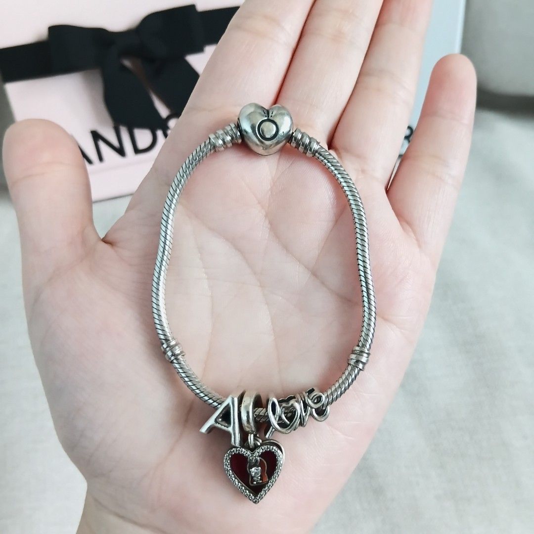 Authentic Pandora Bracelet with Charms (Category: Bracelets) located in Angeles City. Submitted by itsandspreloved (Listing ID 1468530486, Image 2). Description: -used ocassionally - with paperbag,box and store receipt -bought at SM Clark.