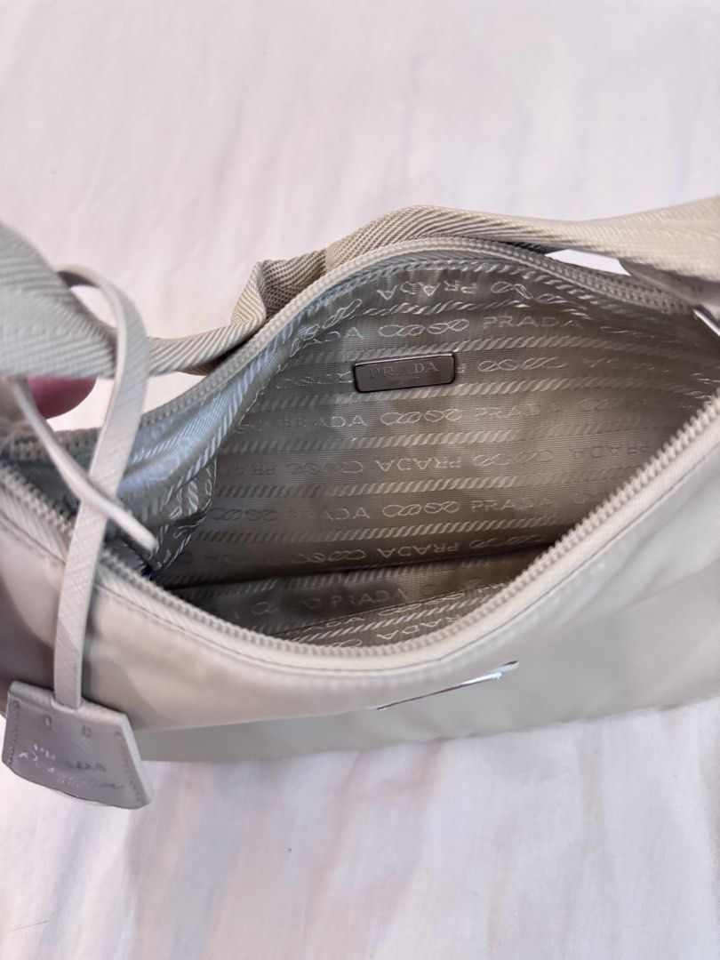 Authentic Prada Re-Edition 2000 Nylon Bag Beige (Category: Luxury Bags & Wallets) located in Manila. Submitted by closet.detash (Listing ID 1468652228, Image 3). Description: - Authentic Prada Re edition Beige - 9/10 condition, Like new - Bag only.