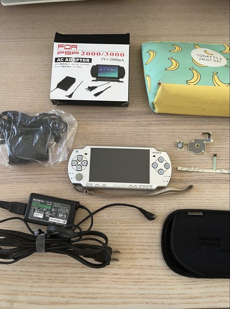 [AUTHENTIC] PSP 2000 Package With Many Games (Category: PlayStation) located in Calamba. Submitted by mochichee (Listing ID 1468711706, Image 2). Description: Inclusions: ✨ PSP with 50+ games (incl. Gameboy, GBA, NES games) ✨ 1x Original Sony PSP Charger ✨ 1x Backup PSP Charger ✨ 1x pouch ✨ 1x extra parts for buttons ‼️ PLEASE READ ‼️ ✨ PSP only works when using a charger (battery c/o buyer) ✨ Original Sony charger is a bit loose but still works.