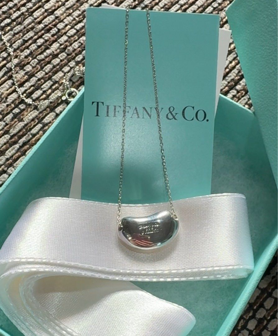 Authentic Tiffany & Co. Large Bean necklace (Category: Necklaces) located in Caloocan City. Submitted by jsa_kawaii (Listing ID 1468501829, Image 2). Description: Authentic Tiffany & Co. Large Bean necklace Silver 925 18” chain Excellent condition 10880 + SF .