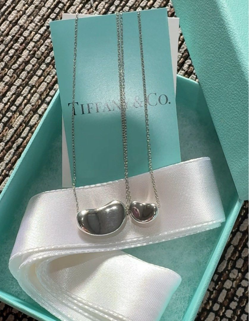 Authentic Tiffany & Co. Large Bean necklace (Category: Necklaces) located in Caloocan City. Submitted by jsa_kawaii (Listing ID 1468501829, Image 3). Description: Authentic Tiffany & Co. Large Bean necklace Silver 925 18” chain Excellent condition 10880 + SF .