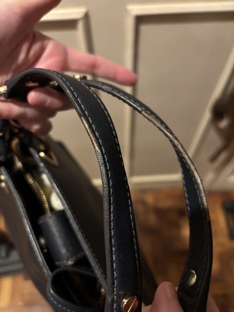 Authentic Vintage Michael Kors Leather Satchel (Category: Luxury Bags & Wallets) located in Manila. Submitted by eliteinme (Listing ID 1468668786, Image 2). Description: Michael Kors Vintage Leather Bag without long strap and logo charm.