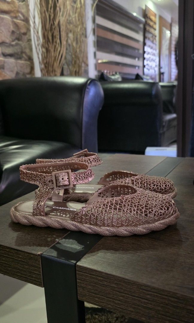 Authetic Melissa Campana (Category: Flats & Sandals) located in Apalit. Submitted by mjtwicedstyle_de_ap (Listing ID 1468548080, Image 1). Description: Authentic Melissa Campana Papel Espadrille slingback sandals in a rose/metallic gold glitter colorway, featuring the signature interwoven Melflex plastic weave designed in collaboration with the Campana brother. slightly used only size 7 US.