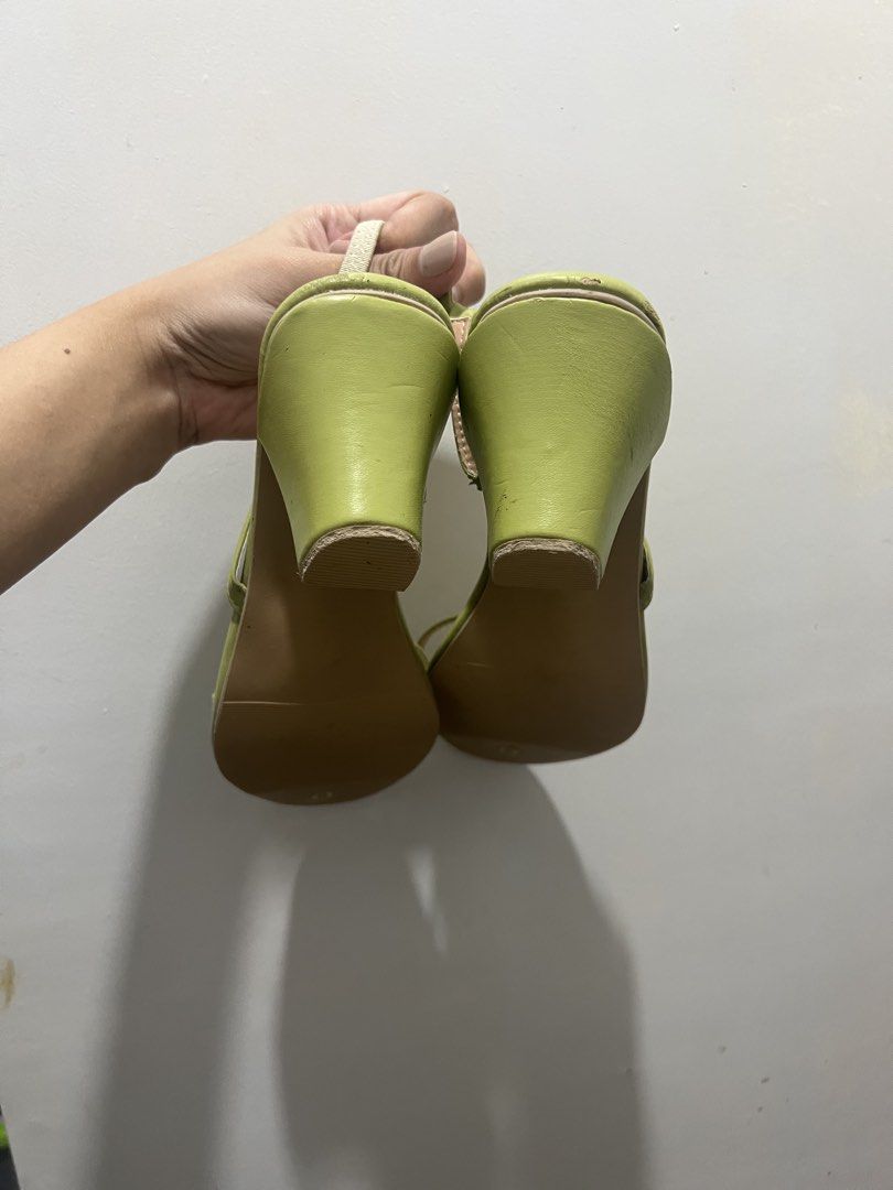 Size 8 Avocado Green Slingback Block Heels (Category: Heels) located in Manila. Submitted by 34samf (Listing ID 1468605092, Image 3). Description: - Color: avocado green - Style: Thin strap slingback sandals with a comfortable chunky block heel - Size: 8 (stamped on sole) - Condition: Minor scuff marks on the front toe and edges from storage. Old pair but never worn. - Perfect for adding a pop of color to any outfit! Location: Manila📍.