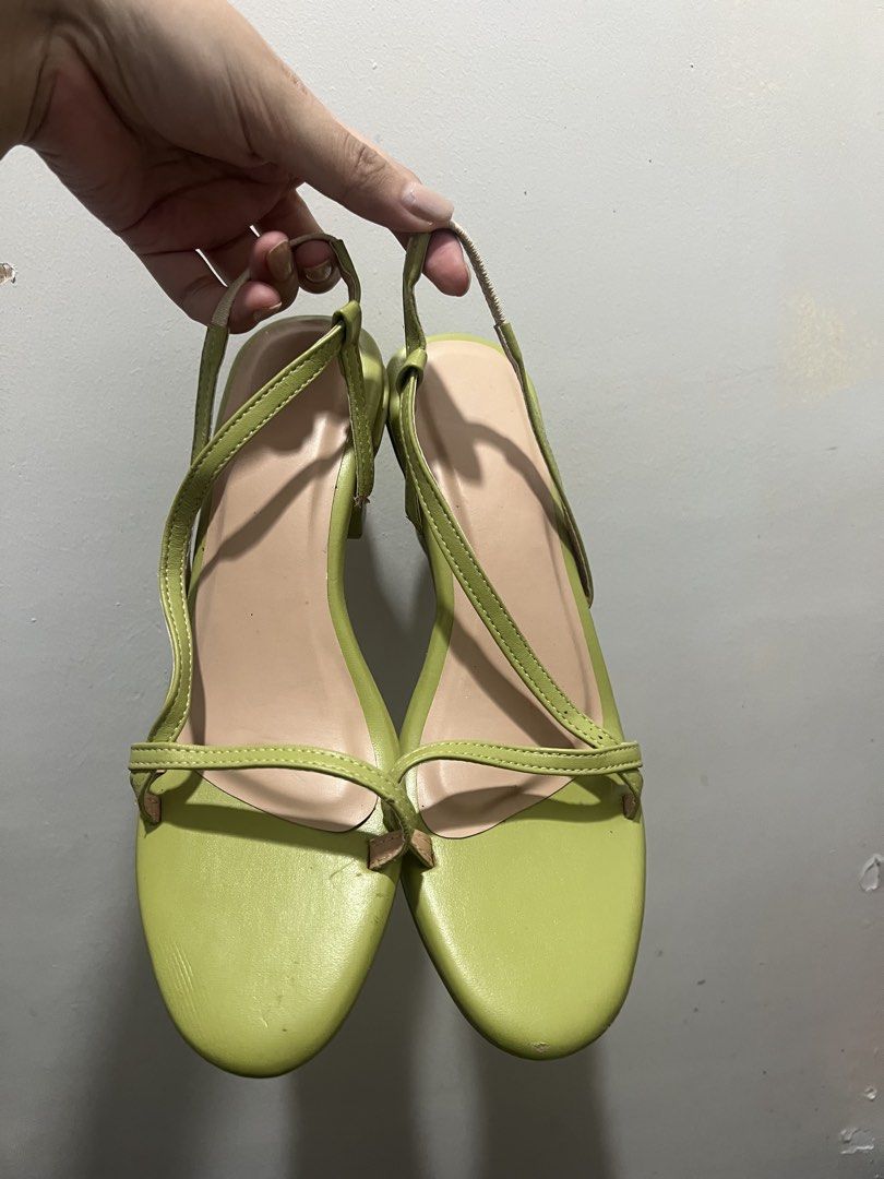 Size 8 Avocado Green Slingback Block Heels (Category: Heels) located in Manila. Submitted by 34samf (Listing ID 1468605092, Image 1). Description: - Color: avocado green - Style: Thin strap slingback sandals with a comfortable chunky block heel - Size: 8 (stamped on sole) - Condition: Minor scuff marks on the front toe and edges from storage. Old pair but never worn. - Perfect for adding a pop of color to any outfit! Location: Manila📍.