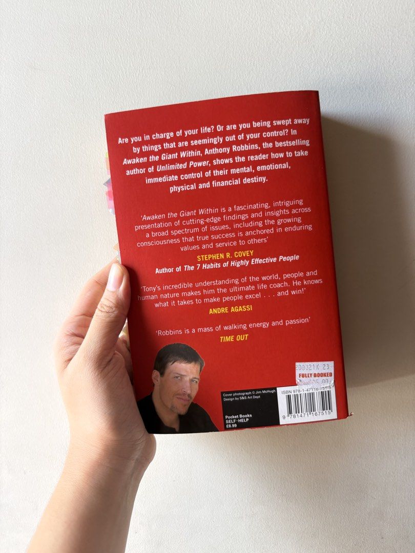 Awaken the Giant Within by Anthony Robbins (Category: Storybooks) located in Pasig City. Submitted by kairodri (Listing ID 1468524159, Image 2). Description: - Title: Anthony Robbins Classic Self-Help Book - Format: Paperback (Pocket Books edition) - Condition: Good read with colorful sticky flags marking helpful sections - Focus: Strategies for mental, emotional, physical, and financial mastery - Perfect for: Personal development and motivation.