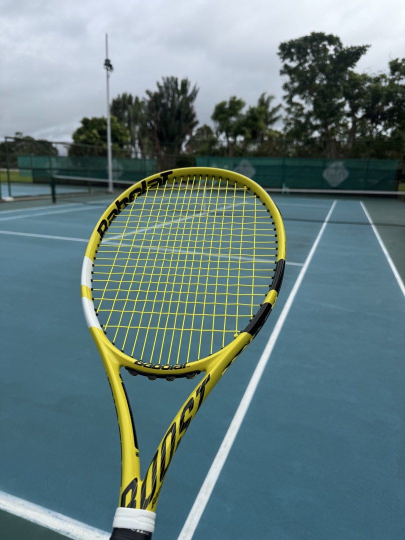Babolat Tennis Racket Yellow (Category: Racket and Ball Sports) located in Quezon City. Submitted by ryliit (Listing ID 1468550178, Image 3). Description: 🎾 Babolat Pure Aero Team 260g (Boost Aero) – 102 sq.in. – Pre-owned Selling my Babolat Pure Aero Team / Boost Aero in iconic yellow-black! Great spin and power, perfect for beginners to intermediate players looking for a light, forgiving Pure Aero feel. Specs: ✅ Brand: Babolat ✅ Model: Boost A