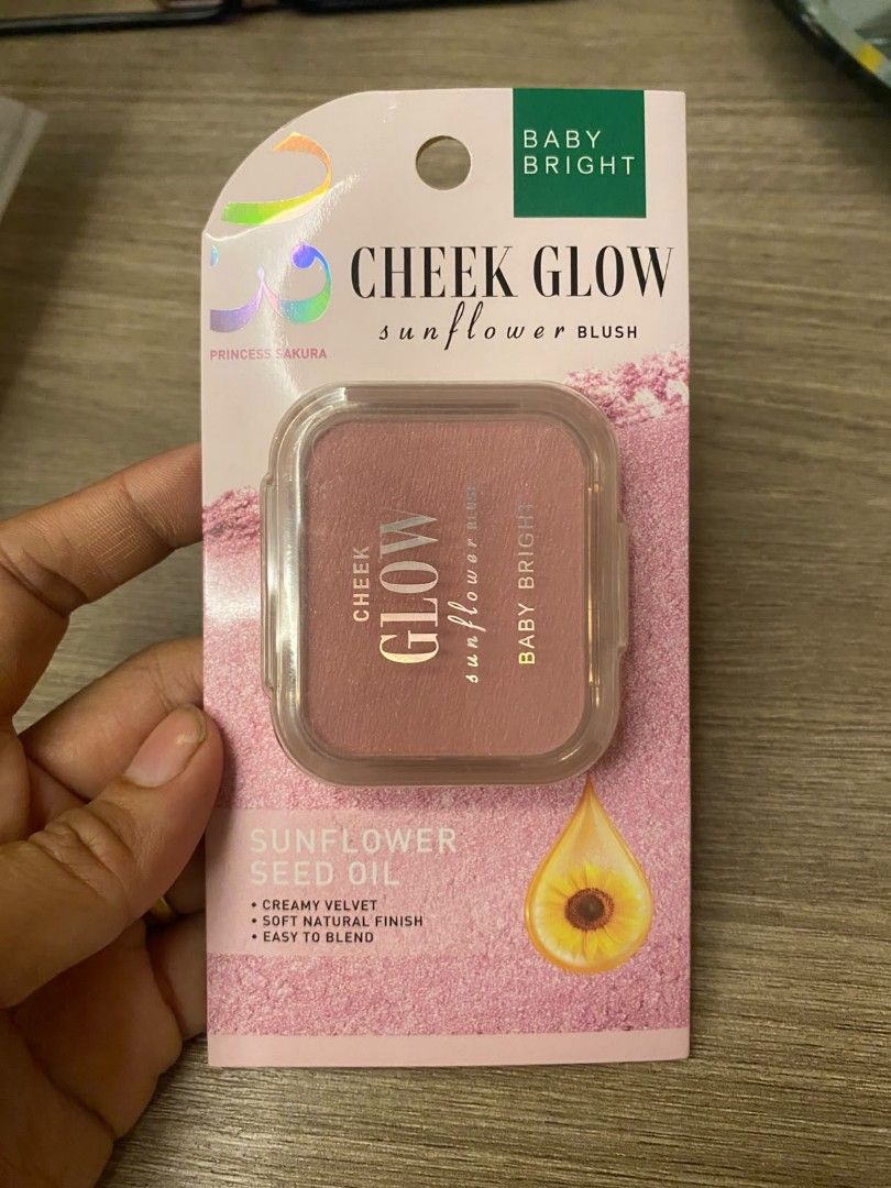 Baby Bright Cheek Glow (Category: Makeup) located in Makati City. Submitted by larasdowry (Listing ID 1468710929, Image 1). Description: - Brand: Baby Bright - Product: Cheek Glow Sunflower Blush - Shade: 03 Princess Sakura - Size: 5.2g - Finish: Soft natural finish with a creamy velvet texture - Key Ingredient: Sunflower seed oil for easy blending - Condition: Brand new, sealed in original packaging - Manufacturing Date: January 2024 - Expiry Da