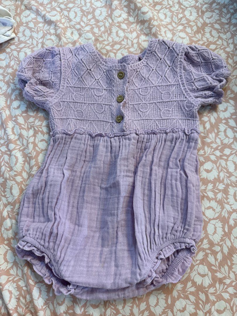 Baby Knit Bubble Romper Purple (Category: Babies & Kids Fashion) located in Santa Maria. Submitted by everydayshop8 (Listing ID 1468522352, Image 1). Description: - Adorable purple baby bubble romper perfect for warm weather - Knitted top half with short puffy sleeves and 3 cute wooden buttons - Textured gauze fabric lower half with ruffled leg openings - Comfortable, lightweight, and stylish outfit for little ones - Condition: Brand new / Excell
