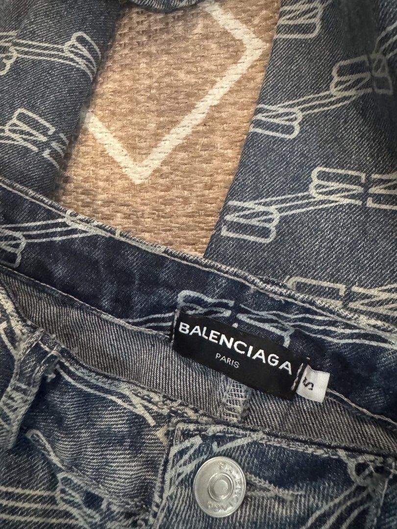 Balenciaga All Over Monogram Jeans Size S (Category: Luxury Apparel) located in Bulacan. Submitted by zyannechlo86360 (Listing ID 1468549018, Image 3). Description: - Brand: Balenciaga - Design: All-over contrasting white BB monogram pattern - Wash: Dark blue wash - Fit: Mid-rise, straight leg cut - Details: Front button closure, classic five-pocket styling - Size: S (tag attached at waistband) - Condition: Clean fabric, heavy material structure,