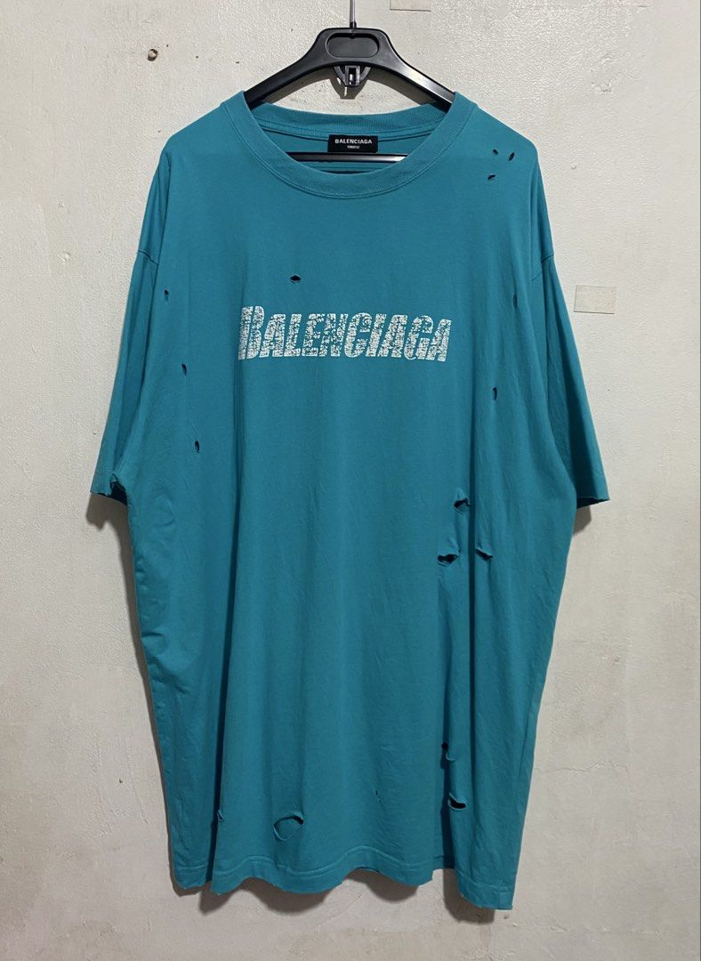 BALENCIAGA DISTRESSED SHIRT (Category: Tshirts & Polo Shirts ) located in Manila. Submitted by brndn.rgld (Listing ID 1468655667, Image 1). Description: 25 Width 32 Length Like new condition No issue Dm ur sure offer only.