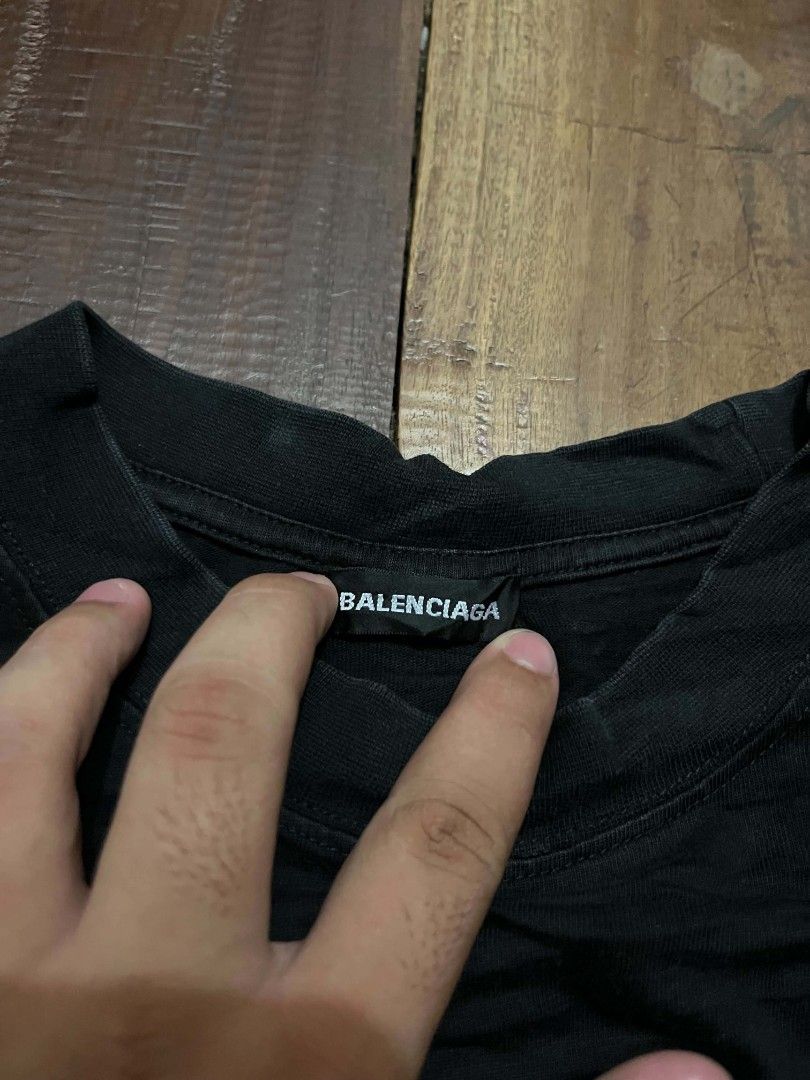 Balenciaga Mastercard Logo Tee Black (Category: Shirts) located in Manila. Submitted by adzwilnams67005 (Listing ID 1468656011, Image 3). Description: - Authentic Black Balenciaga T-shirt - Features iconic Mastercard logo graphic across the chest - Size: S (tag attached) - Fit: Regular fit with classic crew neck and short sleeves - Material: Premium soft cotton - Origin: Made in Portugal - Condition: Brand new with interior branding and wash tags