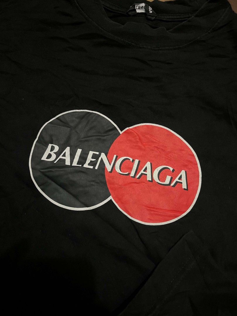 Balenciaga Mastercard Logo Tee Black (Category: Shirts) located in Manila. Submitted by adzwilnams67005 (Listing ID 1468656011, Image 2). Description: - Authentic Black Balenciaga T-shirt - Features iconic Mastercard logo graphic across the chest - Size: S (tag attached) - Fit: Regular fit with classic crew neck and short sleeves - Material: Premium soft cotton - Origin: Made in Portugal - Condition: Brand new with interior branding and wash tags