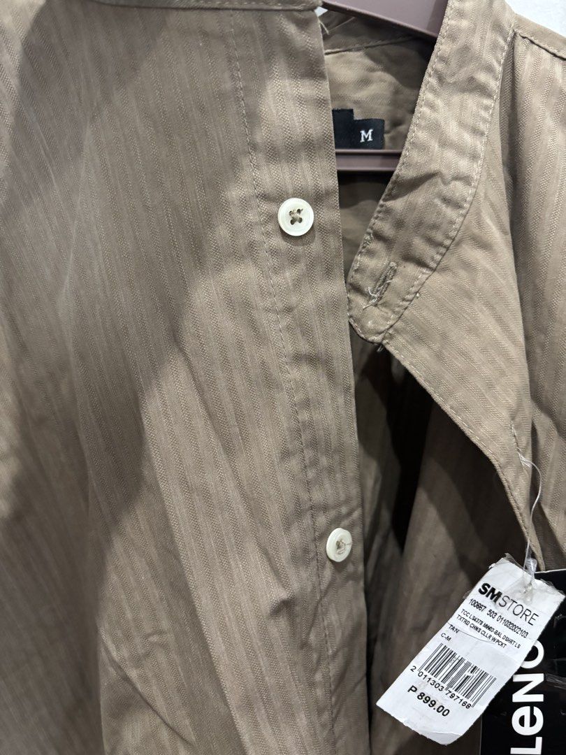 Baleno Tan Textured Long Sleeve Polo (Category: Tshirts & Polo Shirts ) located in Batangas. Submitted by preloved_by_rj (Listing ID 1468533494, Image 3). Description: - Brand: Baleno - Color: Tan - Size: Medium (true to size) - Condition: Brand new with original SM Store tags (₱899 retail) - Design: Mandarin collar, textured stripe pattern, single chest pocket - Clean and never worn.