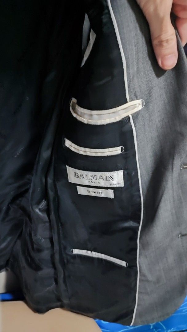 Balmain Paris Suit (Category: Coats, Jackets and Outerwear) located in Quezon City. Submitted by rapstoreph (Listing ID 1468651727, Image 3). Description: - Brand: Balmain Paris - Color: Classic Dark Grey - Fit: Slim fit with structured shoulders - Details: Two-button front closure, notched lapels, clean back with center vent - Interior: Fully lined with multiple practical pockets - Condition: Excellent / Well-maintained - Perfect for: Office wea