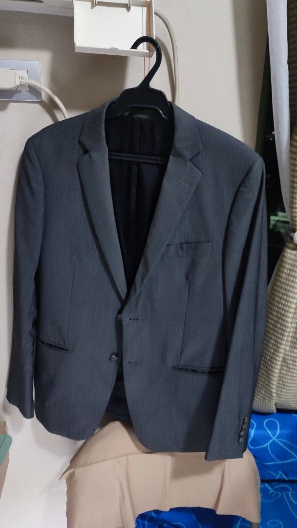 Balmain Paris Suit (Category: Coats, Jackets and Outerwear) located in Quezon City. Submitted by rapstoreph (Listing ID 1468651727, Image 2). Description: - Brand: Balmain Paris - Color: Classic Dark Grey - Fit: Slim fit with structured shoulders - Details: Two-button front closure, notched lapels, clean back with center vent - Interior: Fully lined with multiple practical pockets - Condition: Excellent / Well-maintained - Perfect for: Office wea