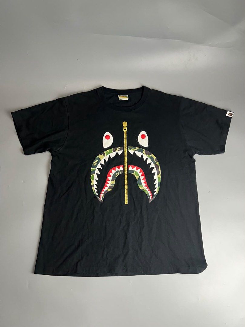 Bape - Shark Camou - Tee (Category: Tshirts & Polo Shirts ) located in San Pablo. Submitted by hiddenrygn (Listing ID 1468534617, Image 1). Description: Bape - Shark Camou - Tee Size : L (22” 28”) No flaws Still in excellent condition Authentic DM!.