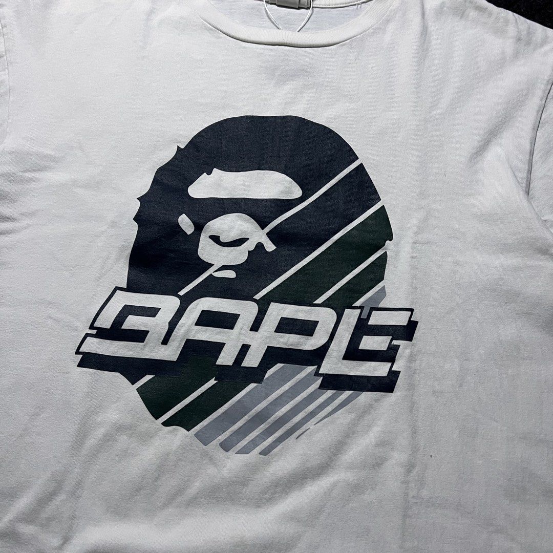 Bape Big Head Speed Racer (Category: Tshirts & Polo Shirts ) located in Davao. Submitted by archived.status (Listing ID 1468578529, Image 2). Description: COLOR MAY VARY DUE TO LIGHTING‼️ Condition: 9.5/10 Color rate: 9.5/20, or better Issue: minimal hairlines for safe Size XL Width 22 Length 28.