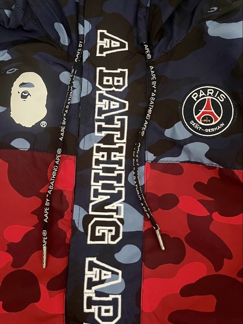 Bape x PSG camo jacket (Category: Coats, Jackets and Outerwear) located in Marikina City. Submitted by menggufinds (Listing ID 1468572936, Image 3). Description: For Sale: BAPE x Paris Saint-Germain camouflage windbreaker jacket Condition: 9/10 Size: L Dimensions: L: 28.5in W: 22in .