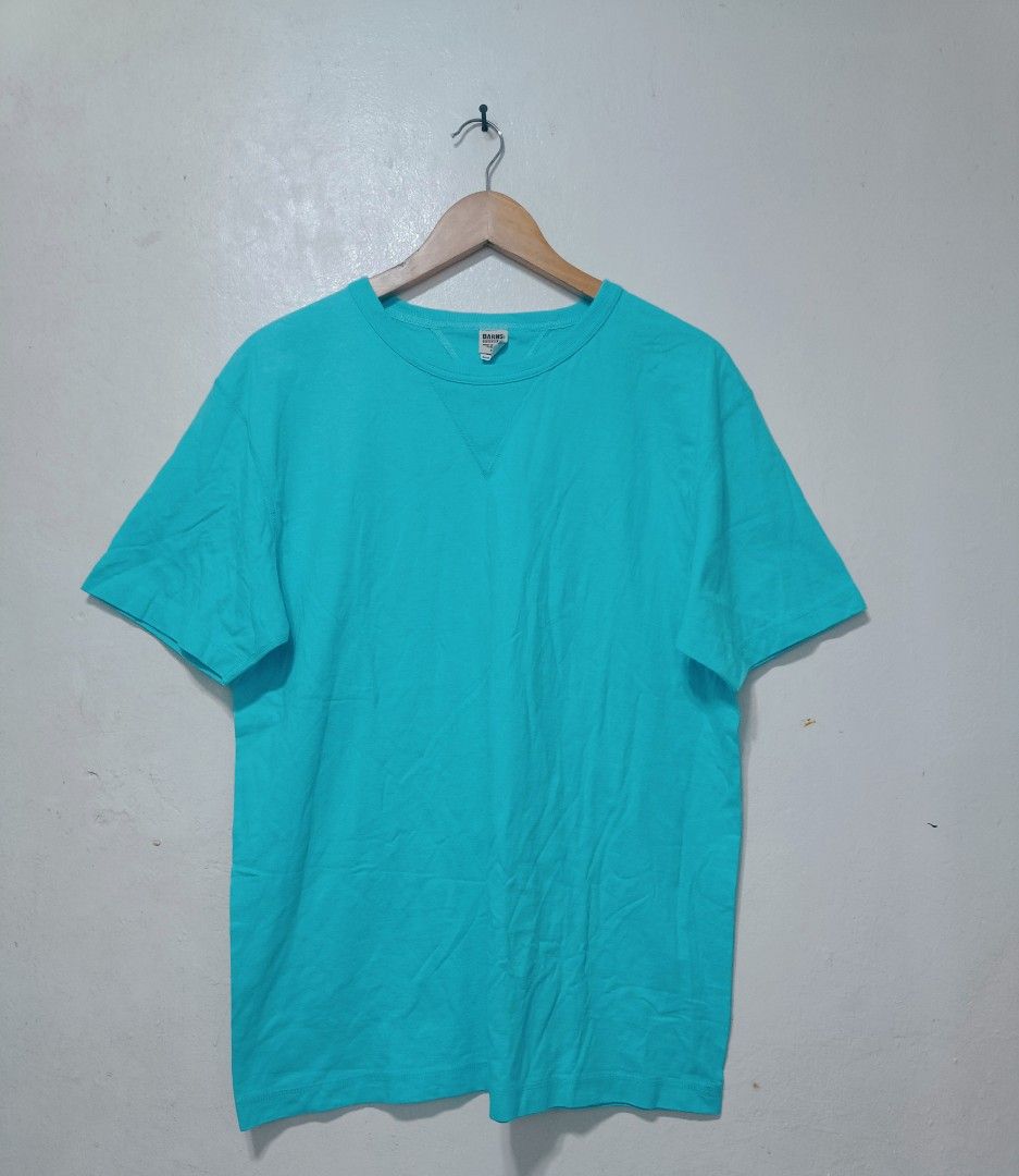 Barns loop wheeled shirt (Category: Activewear) located in Muntinlupa City. Submitted by kamiseta01 (Listing ID 1468630773, Image 1). Description: authentic barns loop wheeled shirt made in Japan medium heavy cotton fabric The highlighted clothing item is a Barns Outfitters COZUN V-Gusset T-Shirt in a vivid turquoise/teal colorway. Barns Outfitters is a renowned Japanese heritage brand highly regarded for producing high-quality basics using vinta