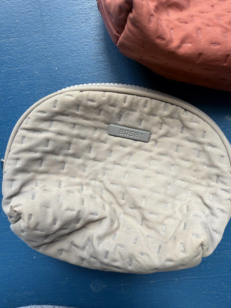 Bash Pouch Cosmetic Bag (Category: Purses & Pouches) located in Iloilo. Submitted by qwertrisha (Listing ID 1468514132, Image 3). Description: - Set of 2 cosmetic pouches in dusty rose and grey With signs of use and fading Php 300.