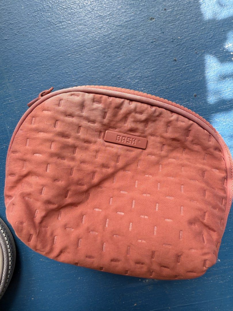 Bash Pouch Cosmetic Bag (Category: Purses & Pouches) located in Iloilo. Submitted by qwertrisha (Listing ID 1468514132, Image 2). Description: - Set of 2 cosmetic pouches in dusty rose and grey With signs of use and fading Php 300.