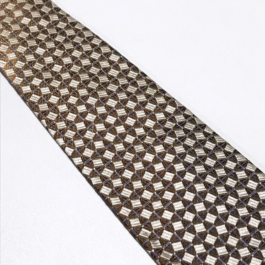 Basic ELLE Jacquard Textured Brown-Champagne Neck Tie (Category: Ties) located in Taguig. Submitted by retrogaze (Listing ID 1468529725, Image 3). Description: This necktie by ELLE (Basic Elle) is crafted with a subtle vertical ombre gradient transition, shifting smoothly from a soft champagne cream near the knot down to a warm bronze-chocolate brown toward the blade. The entire body features a complex geometric tile pattern composed of woven sat