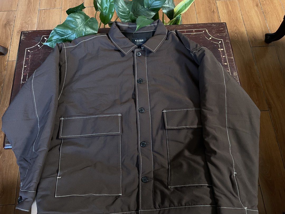 BEAMS HEART Brown Quilted Jacket (Category: Coats, Jackets and Outerwear) located in Manila. Submitted by barrybalenshagga (Listing ID 1468642542, Image 1). Description: - Brand: BEAMS HEART - Size: Small - Color: Dark brown with contrast white stitching - Lining: Quilted black lining - Closure: Button-up front - Pockets: Two large front patch pockets - Condition: Clean, versatile everyday layering piece.