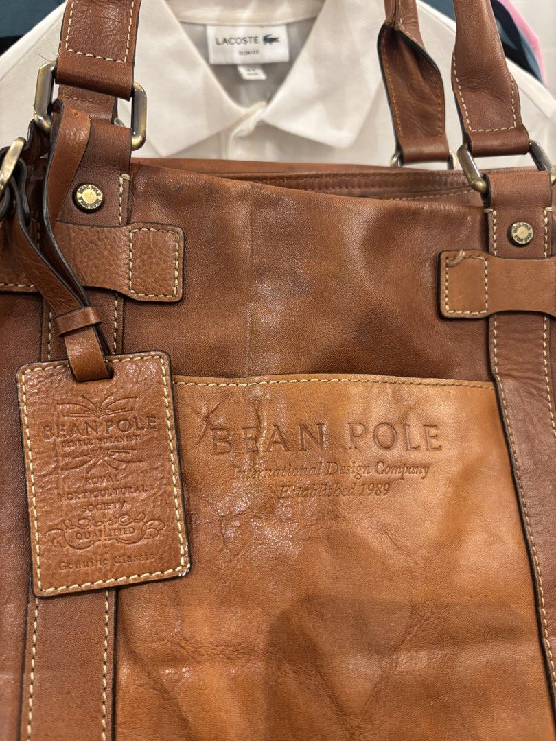 Bean Pole Brown Leather Tote Bag (Category: Tote Bags) located in Manila. Submitted by jeromskito66462 (Listing ID 1468676226, Image 1). Description: - Authentic Bean Pole brown leather tote bag with a classic vintage look - Secure zip-top closure to keep your essentials safe - Convenient front exterior pocket featuring embossed logo detailing - Clean branded fabric lining equipped with an internal zipped compartment - Complete with the original 